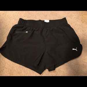 Puma sweat wicking lined running shorts
